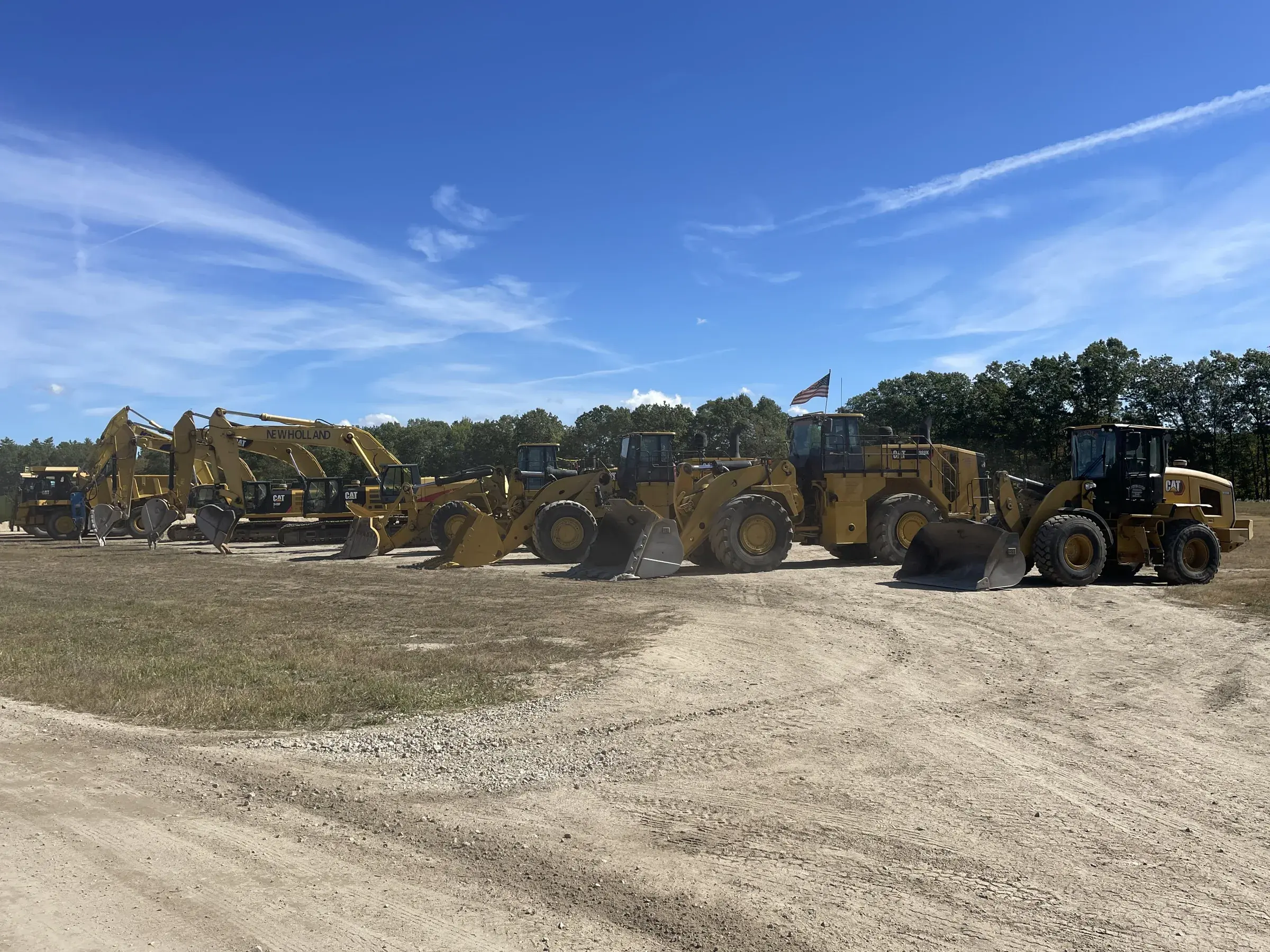 Dubois fleet of CAT loaders and excavators lined up